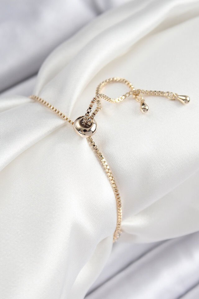 Pirinç Zirkon Taşlı X Detaylı Su Yolu Model Gold Renk Asansörlü Kadın Bileklik - Lisinya