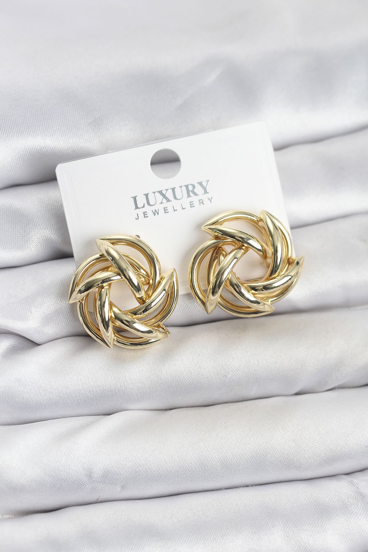 Gold Renk Pirinç Keskin Sarmal Model Kadın Küpe - Lisinya